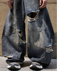 Reversed Waist Distressed Blade Jeans