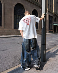 Reversed Waist Distressed Blade Jeans