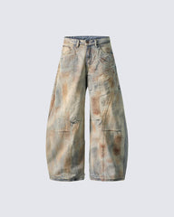 Arc-Cut Distressed Wide-Leg Jeans