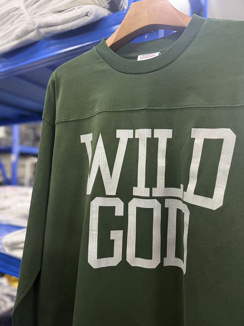 Saint Michael Wild God Varsity 69 Graphic Sweatshirt