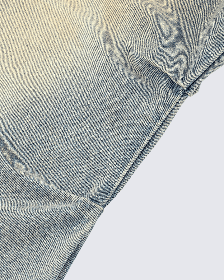 Wide-Leg Denim Jeans with Buttoned Hem