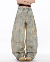 Arc-Cut Distressed Wide-Leg Jeans